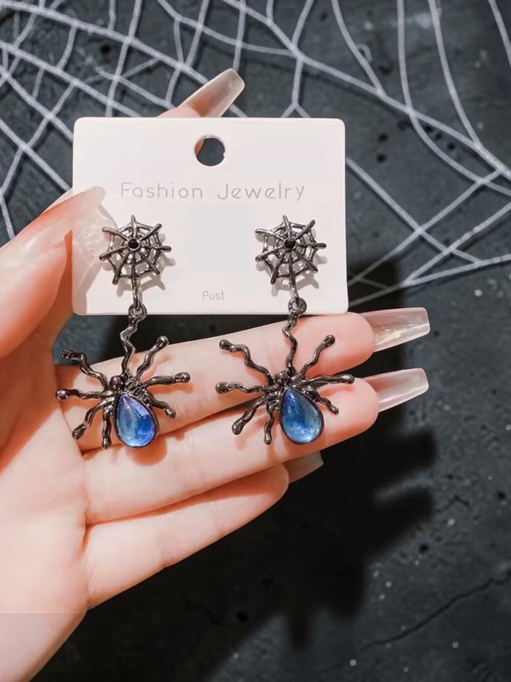 Fashion Jewelry Gunmetal Spider Web Dangle Earrings with Blue Teardrops
